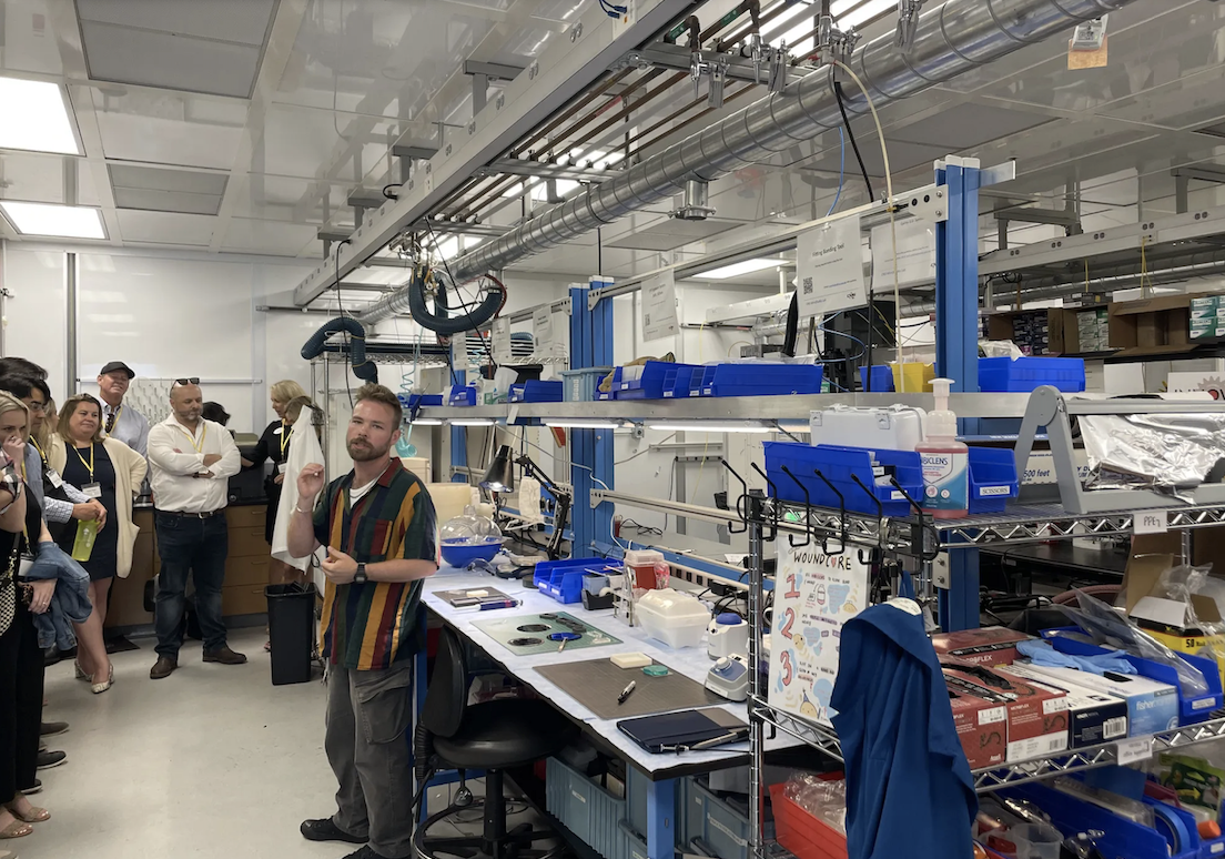 CA NanoSystems Institute Innovation (CNSI) Workshop & Microfluidics Lab Manager Brian Dincau explains CNSI’s work. | Gail Arnold